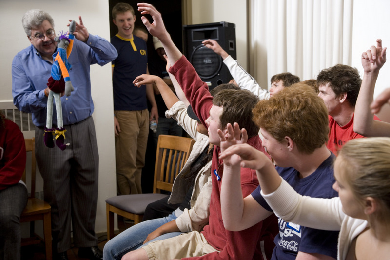 College students participating in a high-energy comedy hypnosis show