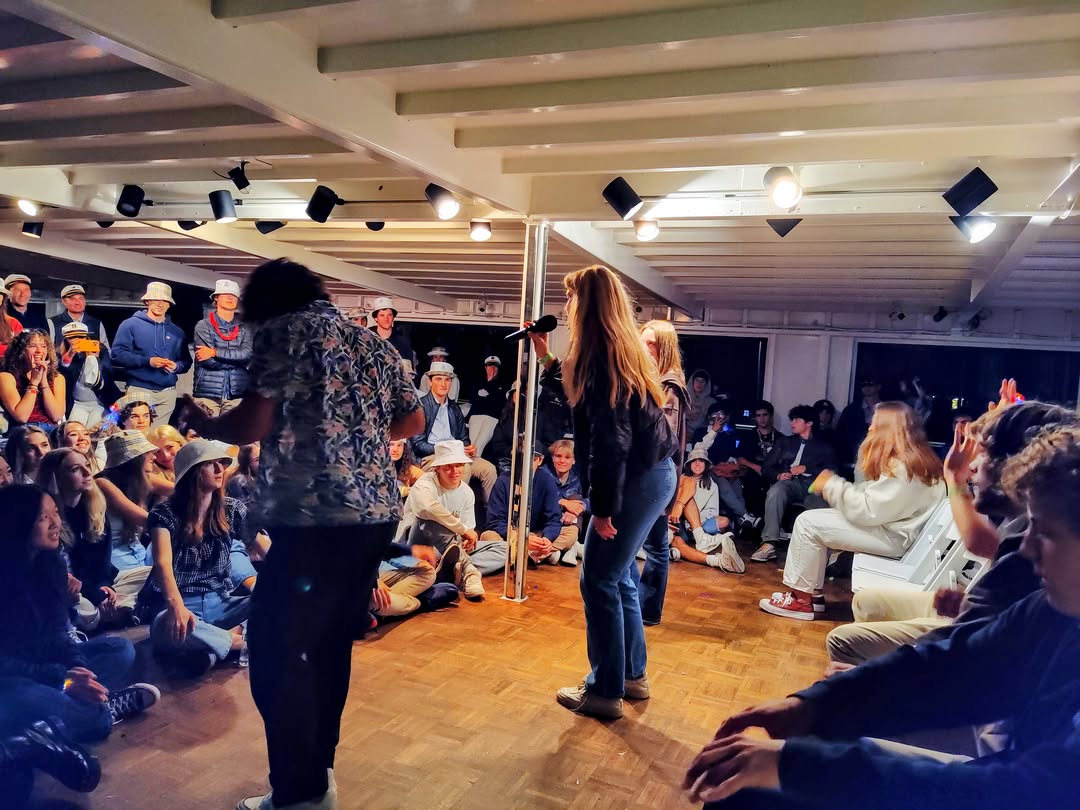 Students enjoying an interactive comedy hypnosis event